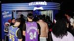 A group of young basketball fans wearing NBA team shirts enter a Hellmann’s sponsored event