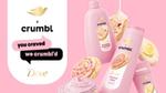 Products from the Dove Crumbl collaboration including Confetti Cake body wash, with the words “You craved, we Crumbl’d”