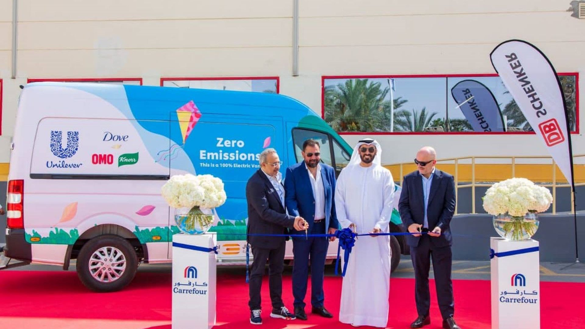 Khalil Yassine, Head of Arabia and Ahmed Kadous, Head of Customer Operations Arabia ribbon-cutting.