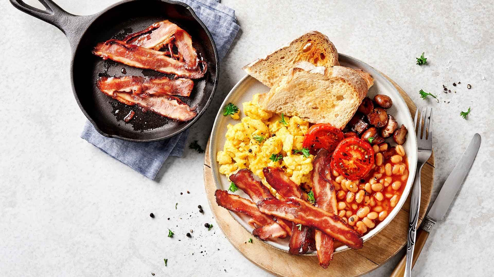 Image of scrambled eggs with The Vegetarian Butcher NoBacon, beans and tomatoes, toast and mushrooms