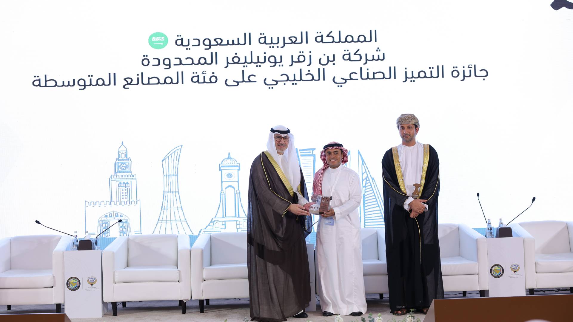 Factory manager Mohannad Rizq receiving award