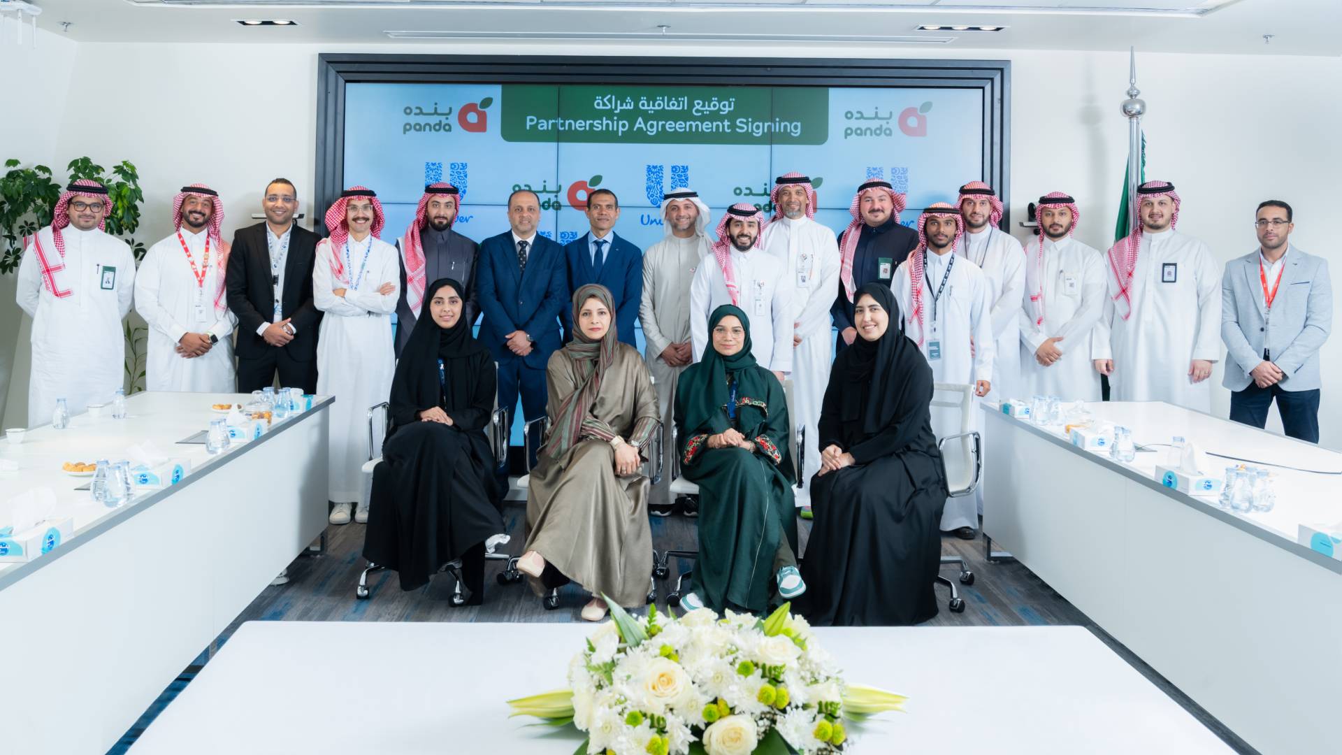 Unilever and Panda employees in a group pictur