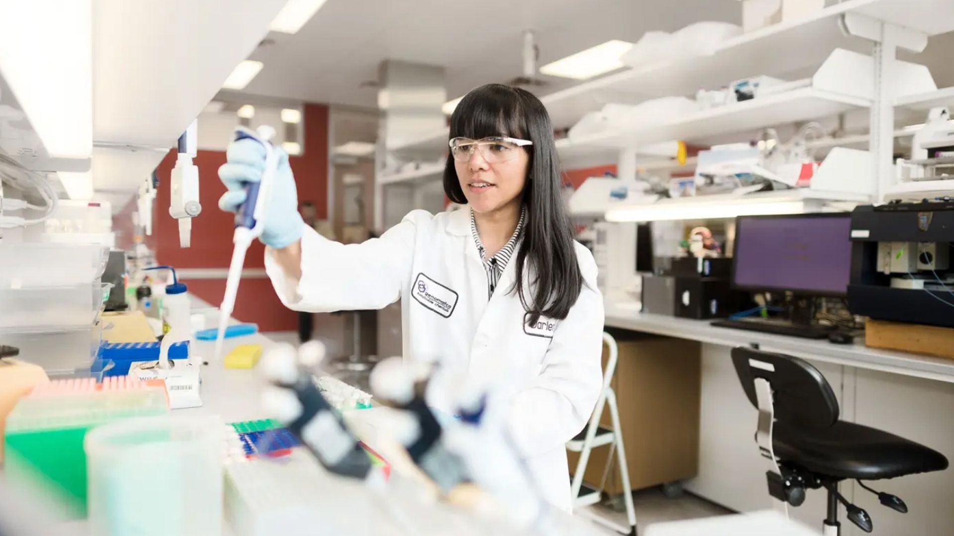 Scientist in lab at Genomatica. Unilever is partnering Genomatica to scale alternatives to fossil fuel-derived ingredients.
