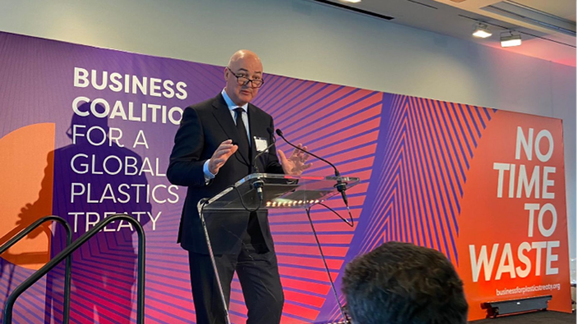 Alan Jope speaking from a podium on financials at the 77th United Nations General Assembly during Climate Week in New York
