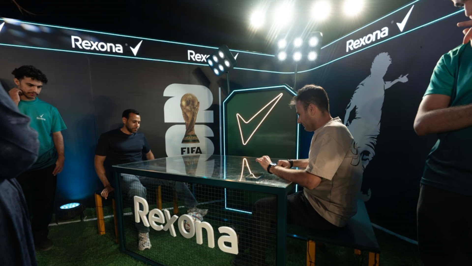People playing soccer during Rexona’s FIFA trophies event
