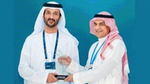 Brand Protection Director Isam receiving the award from Minister or UAE Economy
