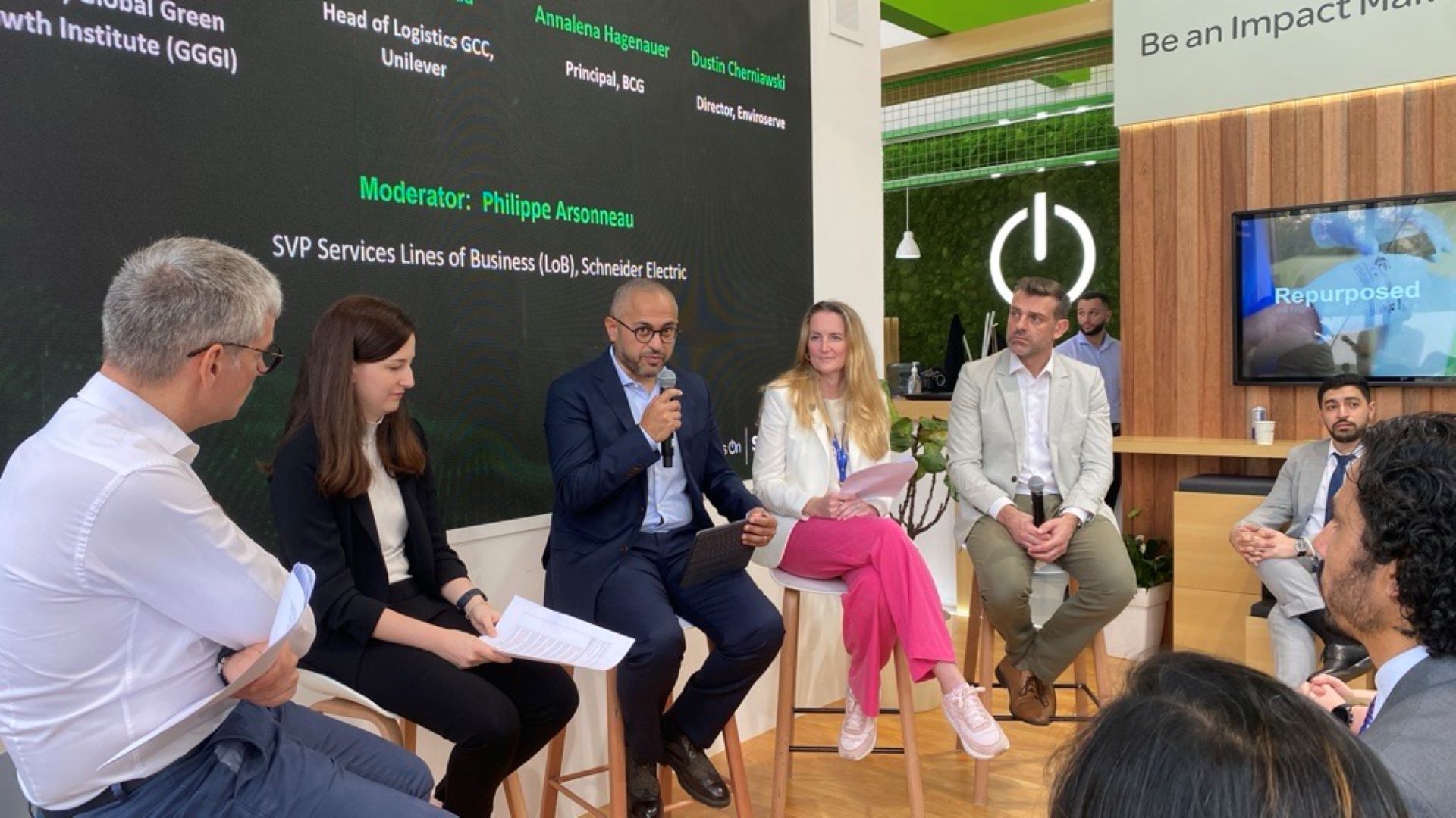 A group of people at a panel discussion.