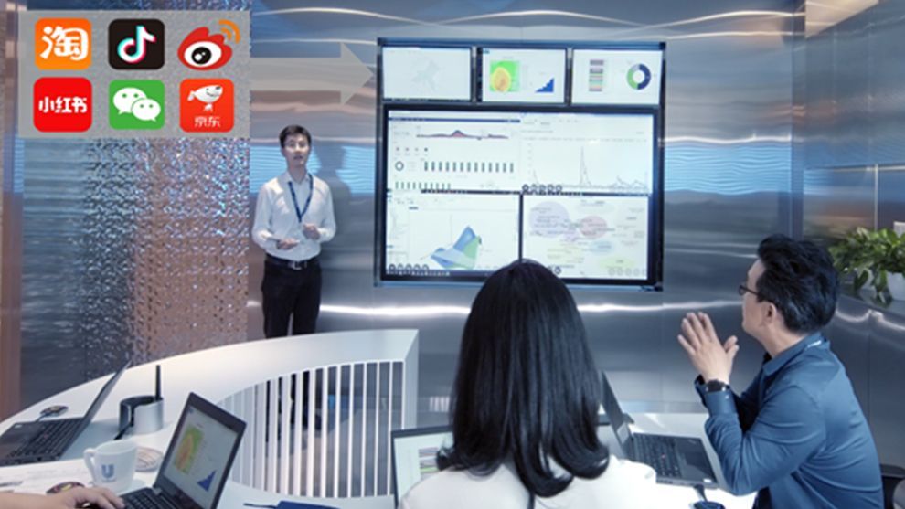 Man presenting data to two colleagues. Agile teams are drastically reducing the time it takes to bring ideas to market