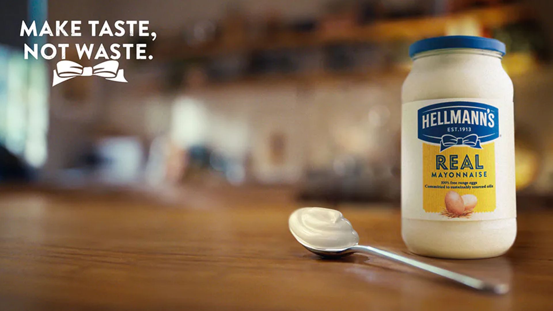 A jar and spoon of Hellmann’s mayonnaise showcasing the brand’s Make Taste, Not Waste campaign 
