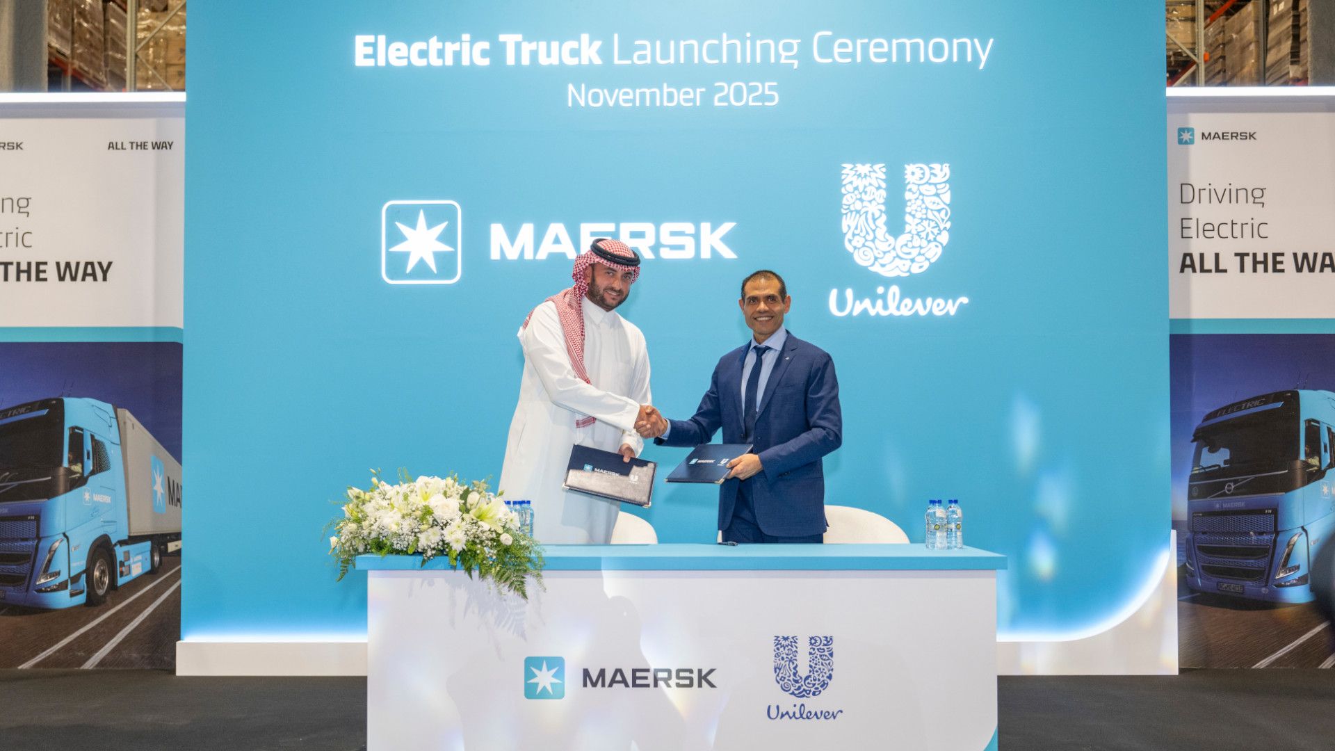 Mohamed El Zouka and Maersk leader signing the agreement