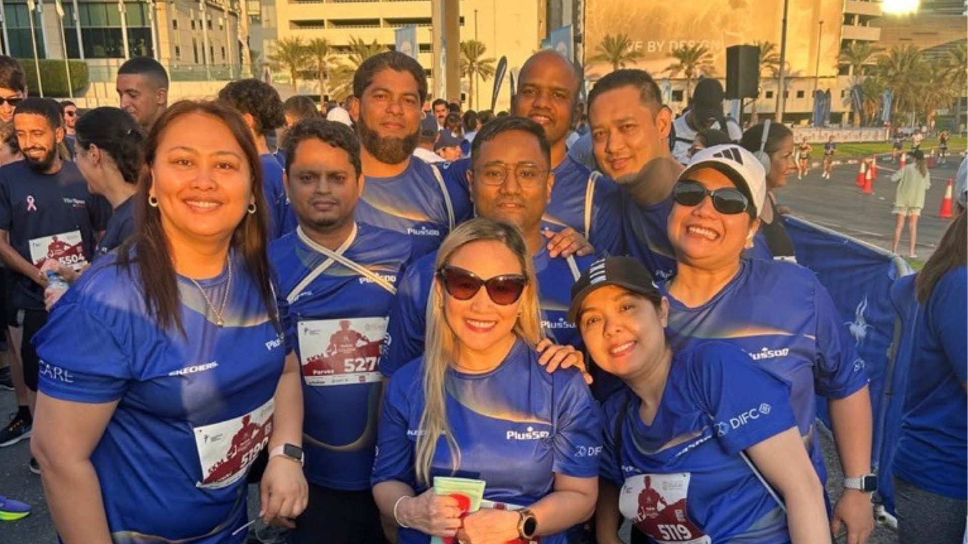 Employees grouped together at the marathon
